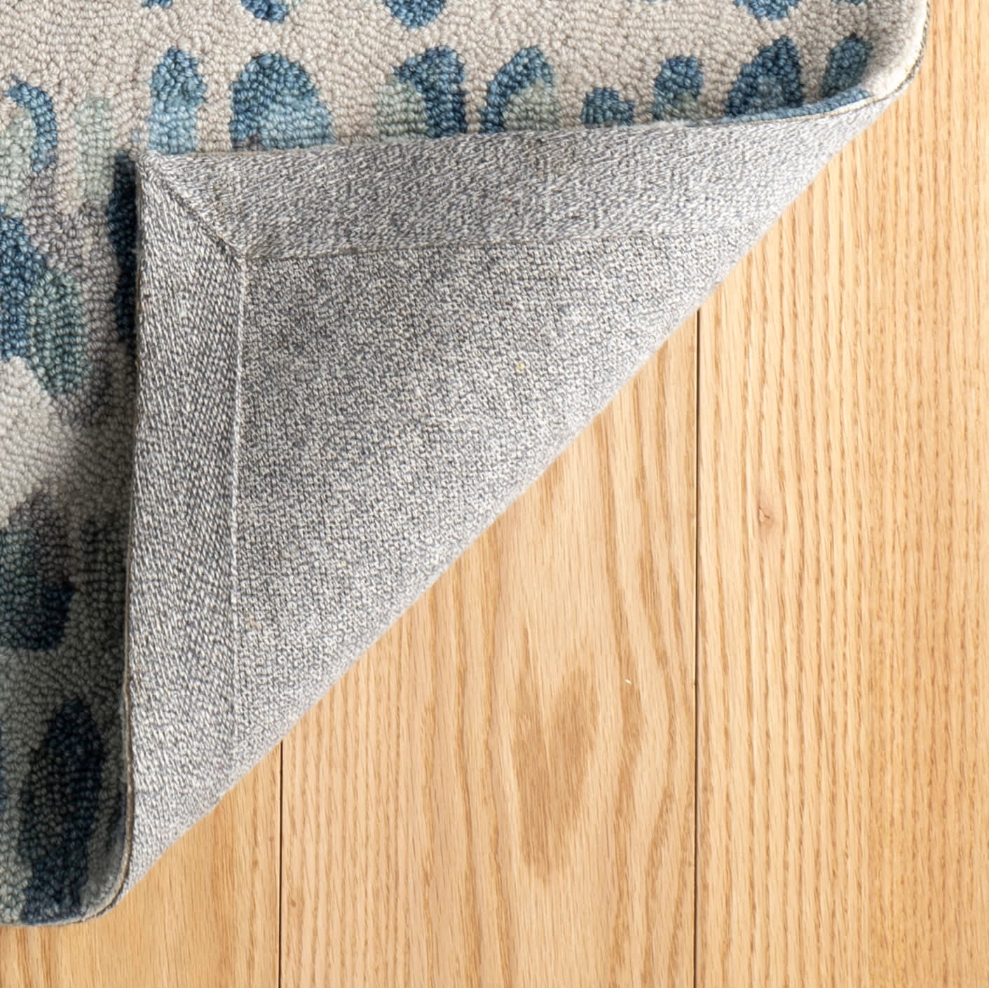 paint chip hand micro hooked wool rug | blue paint chip hand micro hooked wool rug | blue