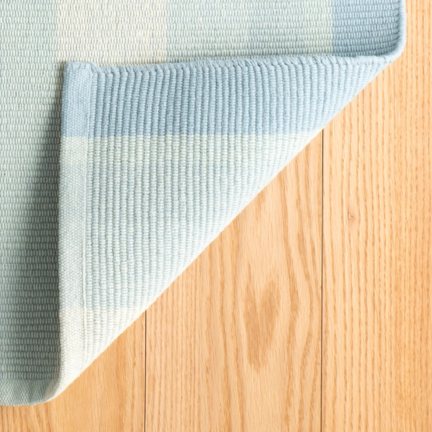 shore stripe handwoven cotton rug | sky blue shore stripe handwoven cotton rug | sky blue